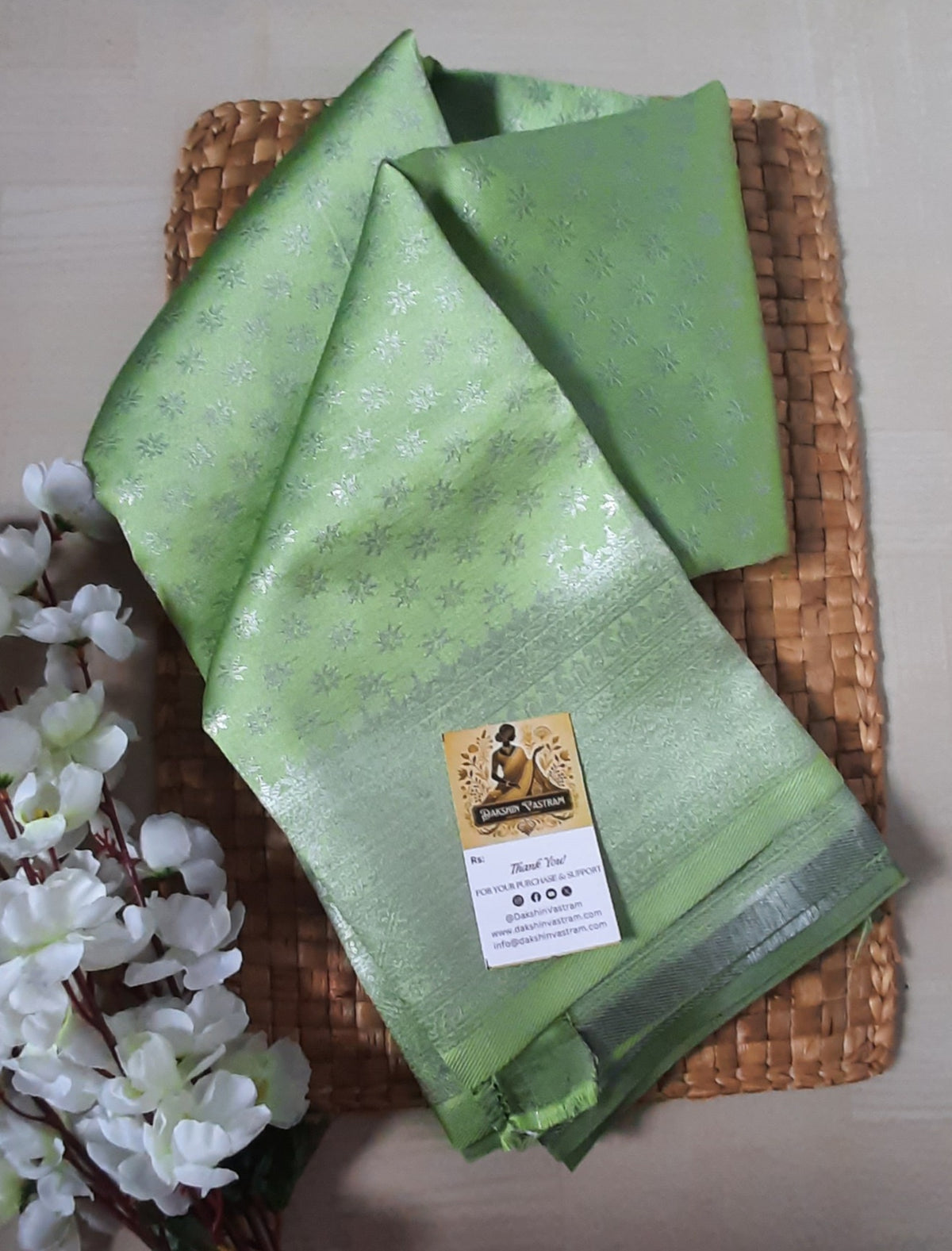 Side profile of the Mow Silk Saree, highlighting the elegant drape and radiant sheen of the organic silk.