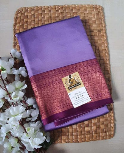 Saree Front Side: Front view of the Mow Silk Saree, showcasing its glossy texture and intricate design.
